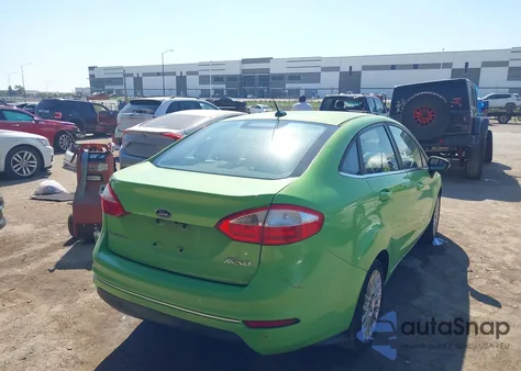 2014 Ford Fiesta Titanium из США, поврежденный, VIN 3FADP4CJ6EM212162